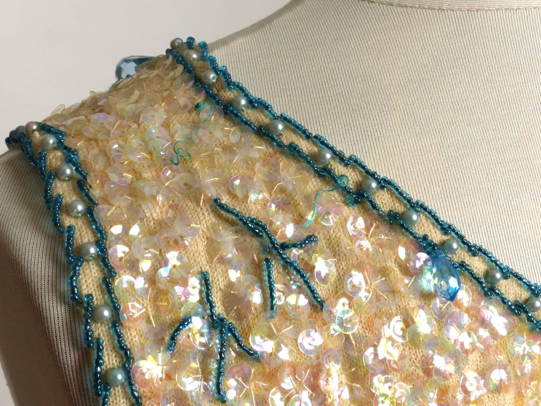 Circa 1960s Hong-Kong Wool Sequin and Beaded Cream and Blue Shell Sweater