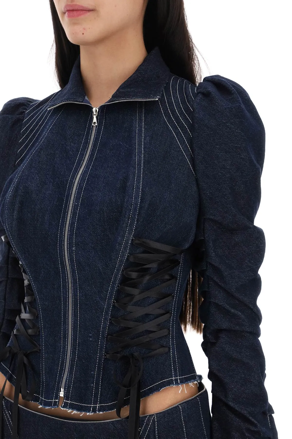 Denim jacket with corset waist design.