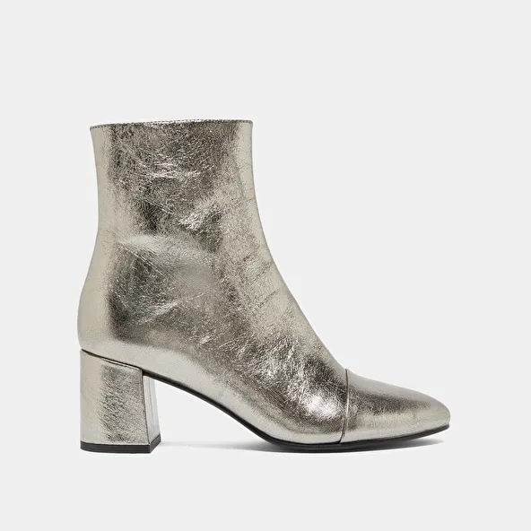 Heeled ankle boots in dark metallic leather