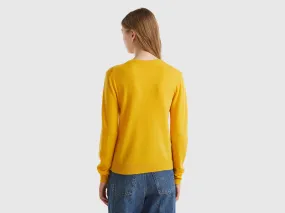 Ochre yellow crew neck sweater in pure Merino wool - Mustard | Benetton