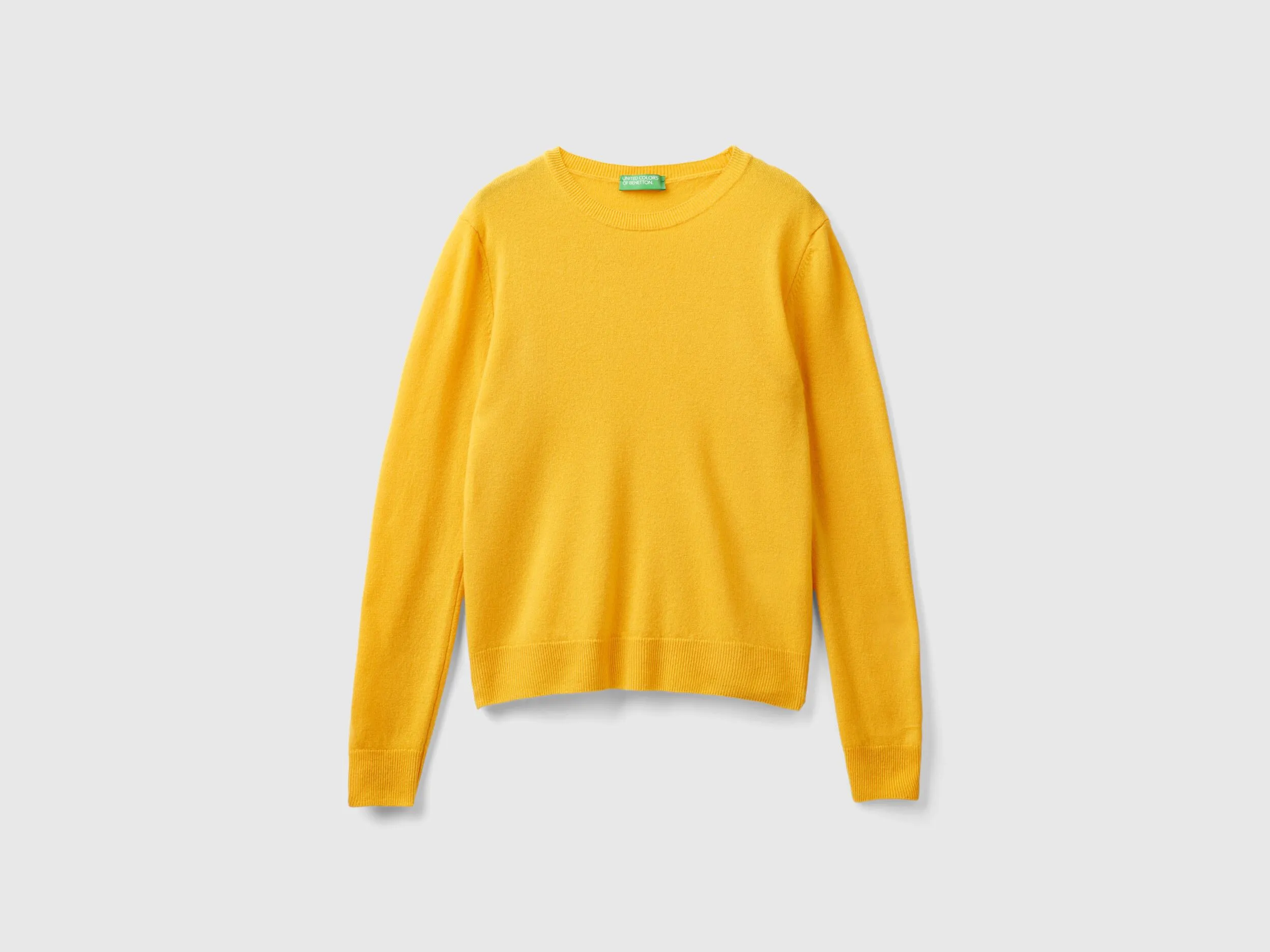 Ochre yellow crew neck sweater in pure Merino wool - Mustard | Benetton