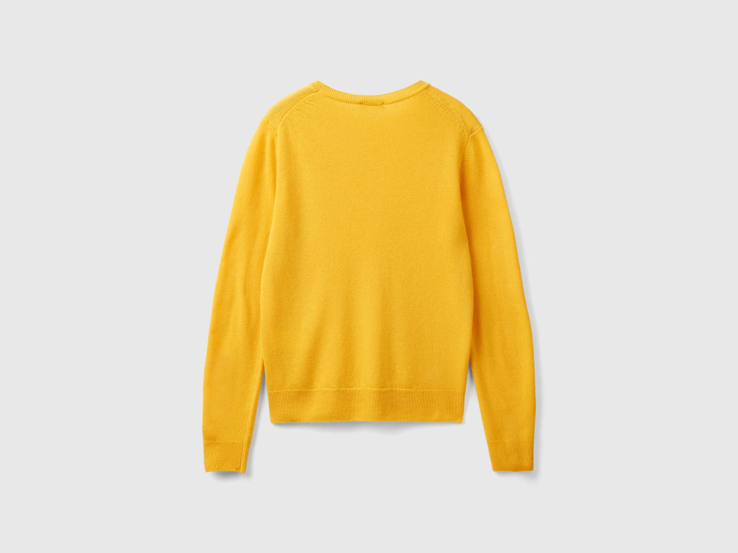 Ochre yellow crew neck sweater in pure Merino wool - Mustard | Benetton