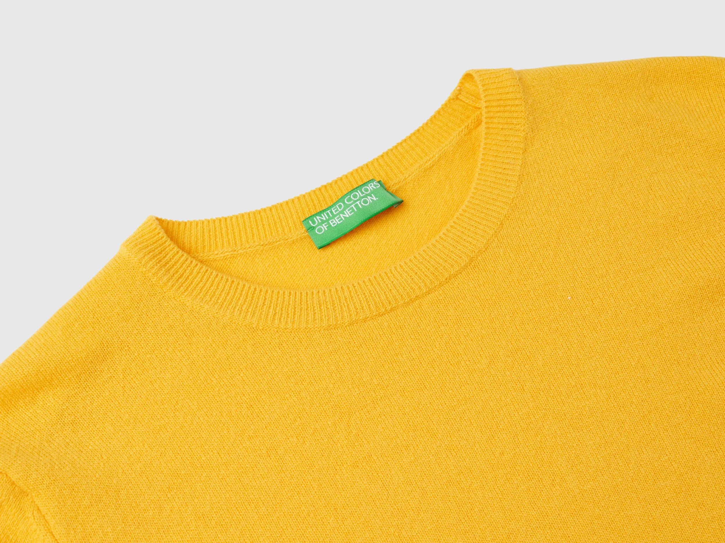 Ochre yellow crew neck sweater in pure Merino wool - Mustard | Benetton