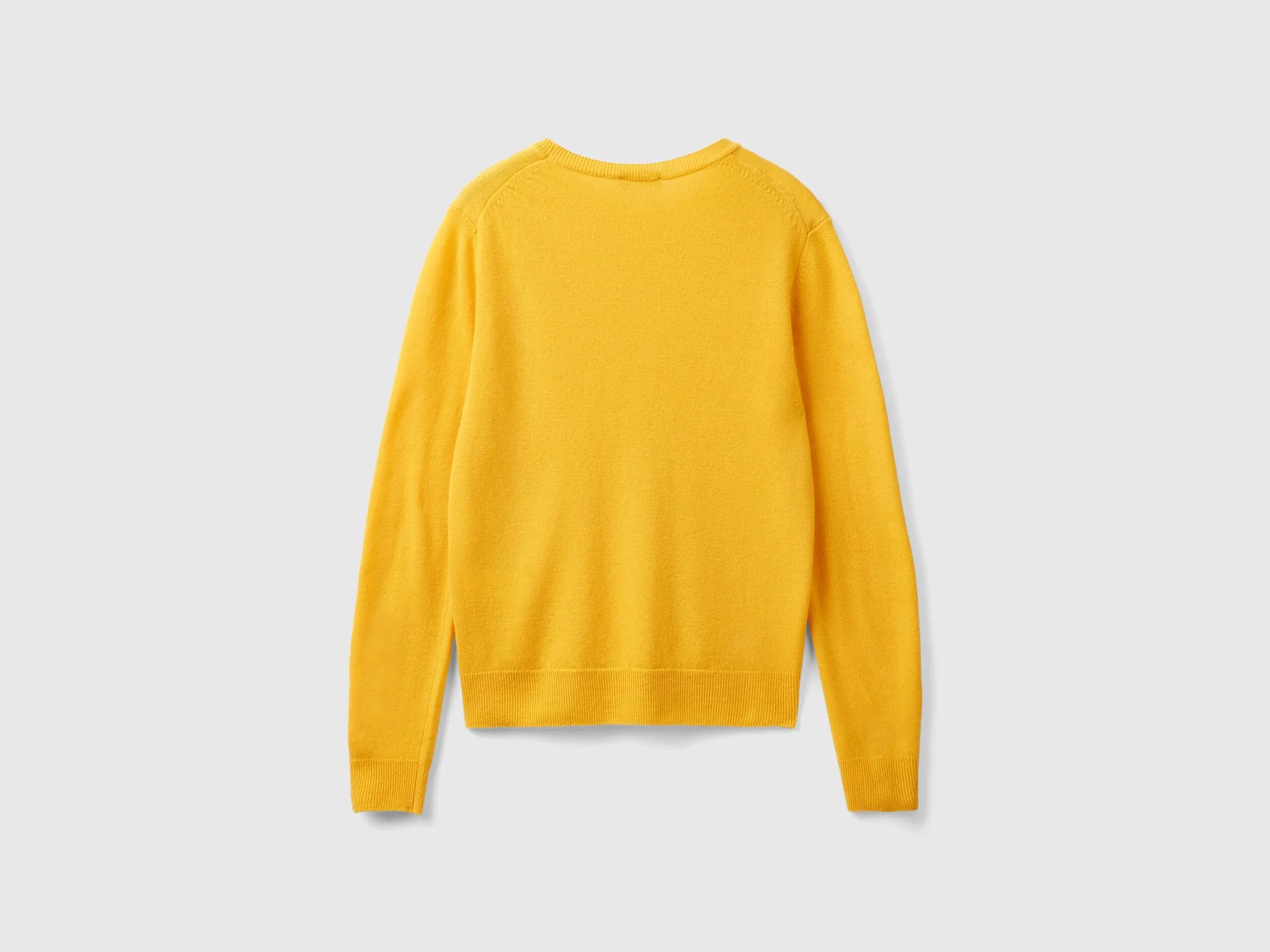 Ochre yellow crew neck sweater in pure Merino wool - Mustard | Benetton